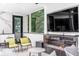 Comfortable seating area with a fireplace and a large screen TV at 100 Murray Blvd, Charleston, SC 29401