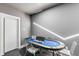 Basement poker room with a blue poker table at 100 Murray Blvd, Charleston, SC 29401