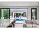 Indoor view of a backyard with a refreshing pool at 100 Murray Blvd, Charleston, SC 29401
