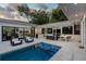 Relaxing pool and patio area with outdoor kitchen at 100 Murray Blvd, Charleston, SC 29401