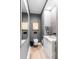 Modern powder room with marble vanity and gray walls at 100 Murray Blvd, Charleston, SC 29401