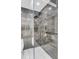 Spa-like shower with marble walls and a rainfall shower head at 100 Murray Blvd, Charleston, SC 29401