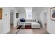 Relaxing sitting area with a comfortable couch, offering a tranquil water view at 100 Murray Blvd, Charleston, SC 29401