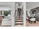 Modern floating staircase with glass railings at 100 Murray Blvd, Charleston, SC 29401