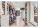 Large walk-in closet with ample shelving, drawers, and hanging space at 100 Murray Blvd, Charleston, SC 29401