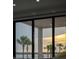 Peaceful sunset view over water, palm trees in foreground at 100 Murray Blvd, Charleston, SC 29401