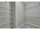 Walk-in closet with wire shelving for ample storage at 1034 Rosewood Ln, Mount Pleasant, SC 29464