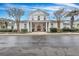 Community clubhouse with white exterior, columns, and landscaping at 1034 Rosewood Ln, Mount Pleasant, SC 29464