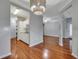Open concept dining area with hardwood floors and kitchen view at 1034 Rosewood Ln, Mount Pleasant, SC 29464