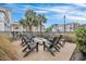 Relaxing outdoor fire pit area with seating and community views at 1034 Rosewood Ln, Mount Pleasant, SC 29464