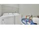 Laundry room with washer, dryer, and water heater at 1034 Rosewood Ln, Mount Pleasant, SC 29464