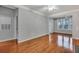 Bright living room with hardwood floors and access to a balcony at 1034 Rosewood Ln, Mount Pleasant, SC 29464
