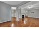 Open concept living room with hardwood floors and fireplace at 1034 Rosewood Ln, Mount Pleasant, SC 29464