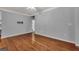 Hardwood floor living room with access to bathroom at 1034 Rosewood Ln, Mount Pleasant, SC 29464