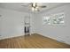 Bedroom with hardwood floors, ceiling fan and en-suite bathroom at 1134 Mim Ave, Charleston, SC 29407