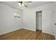 Bedroom with hardwood floors, ceiling fan and closet at 1134 Mim Ave, Charleston, SC 29407