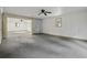 Versatile bonus room with concrete floors and an exposed brick wall at 1134 Mim Ave, Charleston, SC 29407