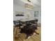 Bright dining room with hardwood floors, a rustic table, and modern chairs at 1134 Mim Ave, Charleston, SC 29407