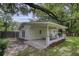 Detached brick garage with covered carport at 1134 Mim Ave, Charleston, SC 29407