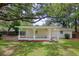 Detached brick garage with covered carport at 1134 Mim Ave, Charleston, SC 29407
