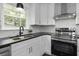 Kitchen with black countertops and stainless steel appliances at 1134 Mim Ave, Charleston, SC 29407