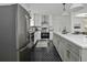 Modern kitchen features stainless steel appliances and white shaker cabinets at 1134 Mim Ave, Charleston, SC 29407