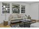 Living area with beige sofa and stylish coffee table at 1134 Mim Ave, Charleston, SC 29407