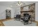 Cozy sitting area with fireplace and built-in shelving at 1134 Mim Ave, Charleston, SC 29407
