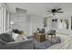 Bright sunroom boasts tiled floors and comfortable seating area at 1134 Mim Ave, Charleston, SC 29407