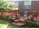 Deck with lush rose bushes and seating at 1449 Waterside Ct, Mount Pleasant, SC 29464
