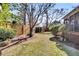 Large backyard with mature trees and landscaping at 1449 Waterside Ct, Mount Pleasant, SC 29464