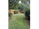 Large backyard with well-maintained lawn and wooden fence at 1449 Waterside Ct, Mount Pleasant, SC 29464