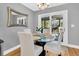 Small breakfast nook with glass table and access to back patio at 1449 Waterside Ct, Mount Pleasant, SC 29464