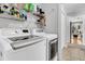 Laundry room with washer, dryer, and shelving at 1449 Waterside Ct, Mount Pleasant, SC 29464