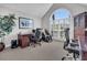 Home office with large window, hardwood floors, and ample workspace at 1449 Waterside Ct, Mount Pleasant, SC 29464