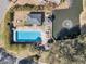 Community pool with lounge chairs and gazebo near pond at 1449 Waterside Ct, Mount Pleasant, SC 29464
