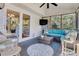 Cozy screened porch offering comfortable seating and view at 1449 Waterside Ct, Mount Pleasant, SC 29464