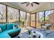 Relaxing screened porch with seating and outdoor furniture at 1449 Waterside Ct, Mount Pleasant, SC 29464