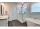Elegant bathroom with double vanity, soaking tub, and glass shower at 1525 Kepley Dr, Mount Pleasant, SC 29464