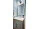Modern bathroom with gray vanity and unique wallpaper at 1525 Kepley Dr, Mount Pleasant, SC 29464