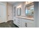 Modern bathroom with double vanity and dark-grey tile flooring at 1525 Kepley Dr, Mount Pleasant, SC 29464