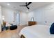 Light and airy bedroom with hardwood floors and stylish furniture at 1525 Kepley Dr, Mount Pleasant, SC 29464