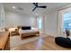 Bright bedroom with hardwood floors, large windows, and a ceiling fan at 1525 Kepley Dr, Mount Pleasant, SC 29464