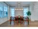 Bright dining room with hardwood floors, a large table, and modern light fixture at 1525 Kepley Dr, Mount Pleasant, SC 29464