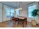 Bright dining room with hardwood floors, a large table, and modern light fixture at 1525 Kepley Dr, Mount Pleasant, SC 29464