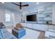 Gathering room boasts a large TV, built-in shelving, and comfortable seating at 1525 Kepley Dr, Mount Pleasant, SC 29464