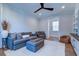 Cozy Gathering room featuring a comfy sofa, ottoman, and built-in shelving at 1525 Kepley Dr, Mount Pleasant, SC 29464