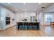 Modern kitchen with white cabinets, large island, and stainless steel appliances at 1525 Kepley Dr, Mount Pleasant, SC 29464