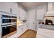 Modern kitchen with white cabinets and stainless steel appliances at 1525 Kepley Dr, Mount Pleasant, SC 29464