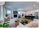 Open concept kitchen and living area with island and hardwood floors at 1525 Kepley Dr, Mount Pleasant, SC 29464